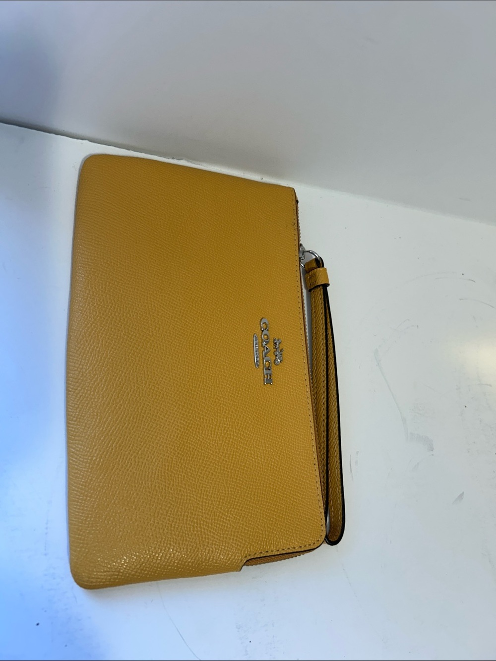 COACH Mustard Yellow Pebbled Leather Wristlet Clutch